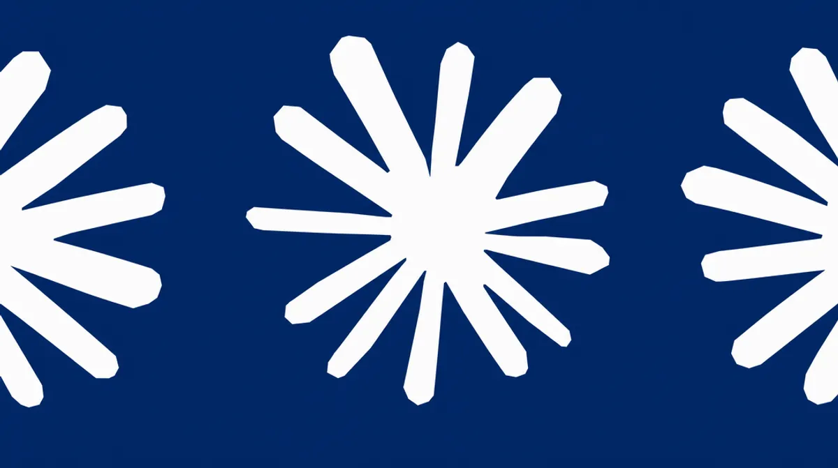 Anthropic logo on an office wall
