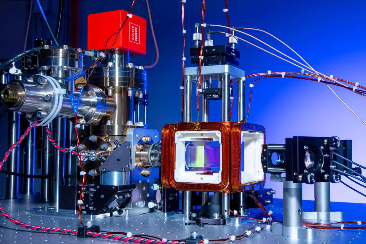A robotic arm in a laboratory setting, representing AI-driven automation of physical scientific equipment